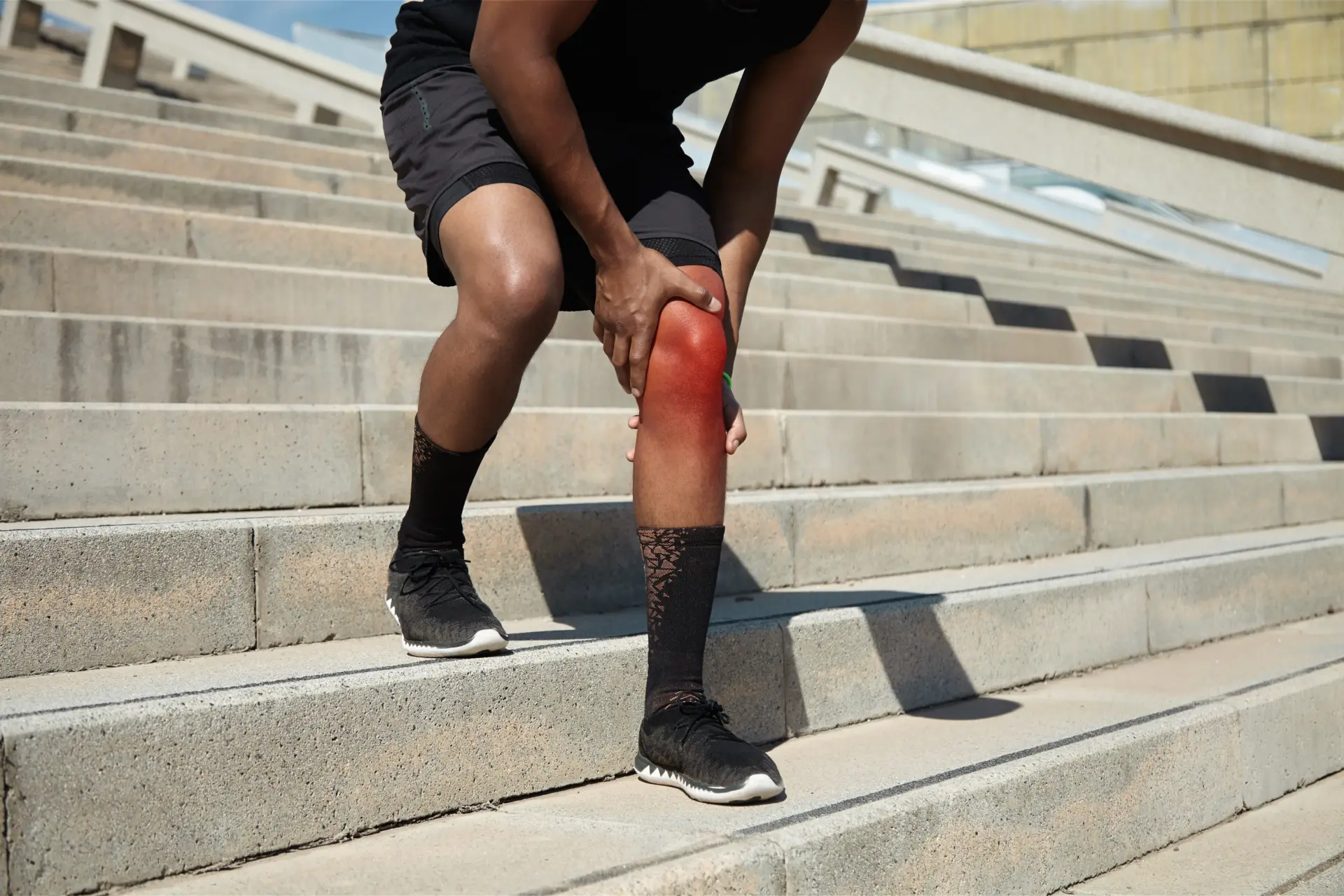 Adult Man With Knee Injury On Concrete Steps 2026 03 26 04 50 47 Utc