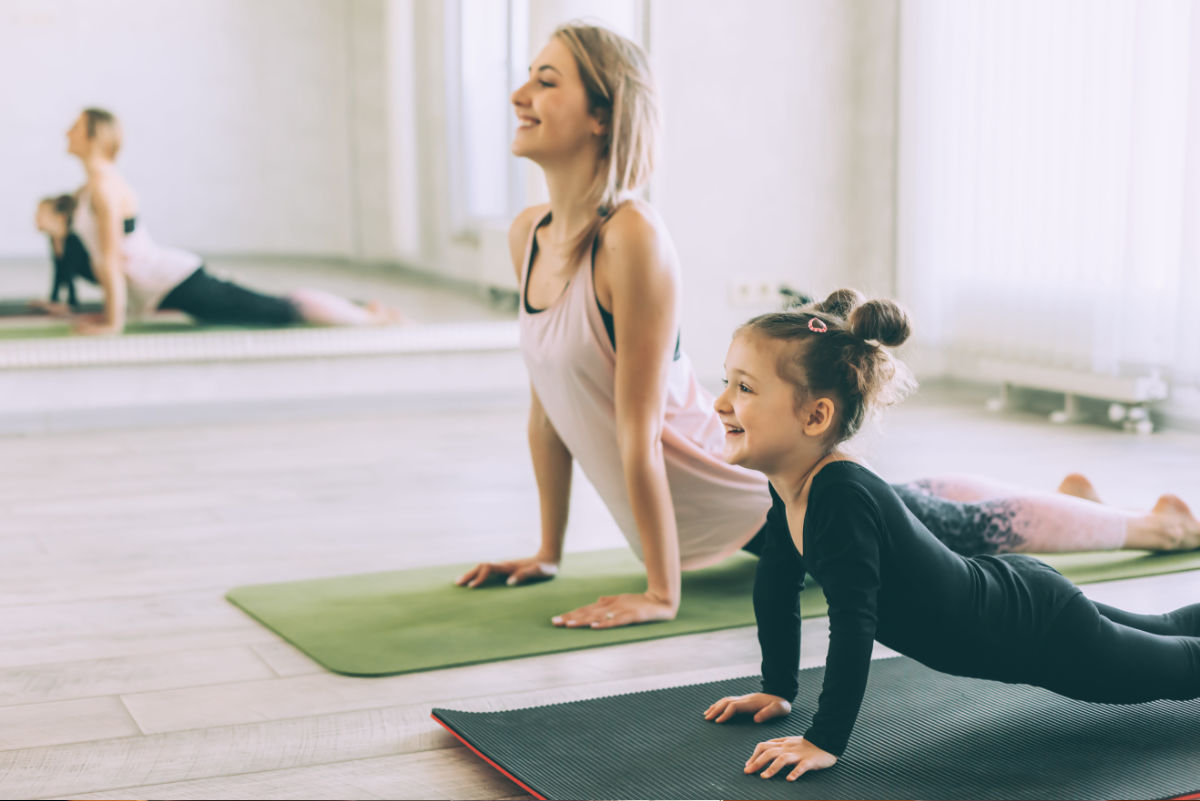 Finding inner peace. A group of people doing yoga together.