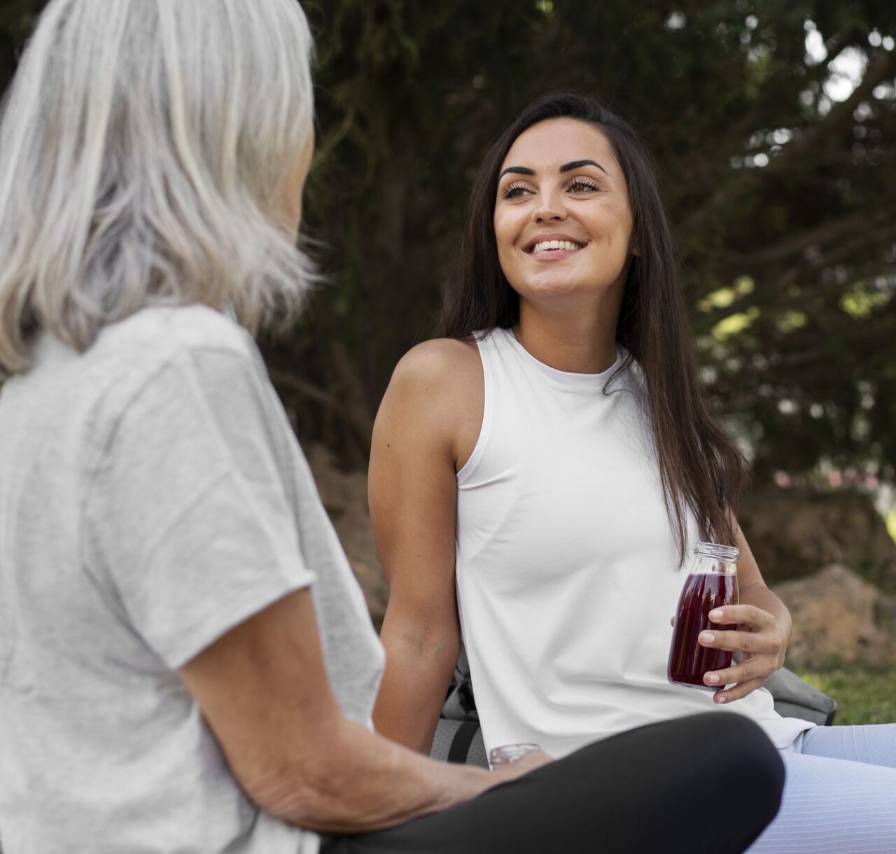 friends-doing-yoga-together-park