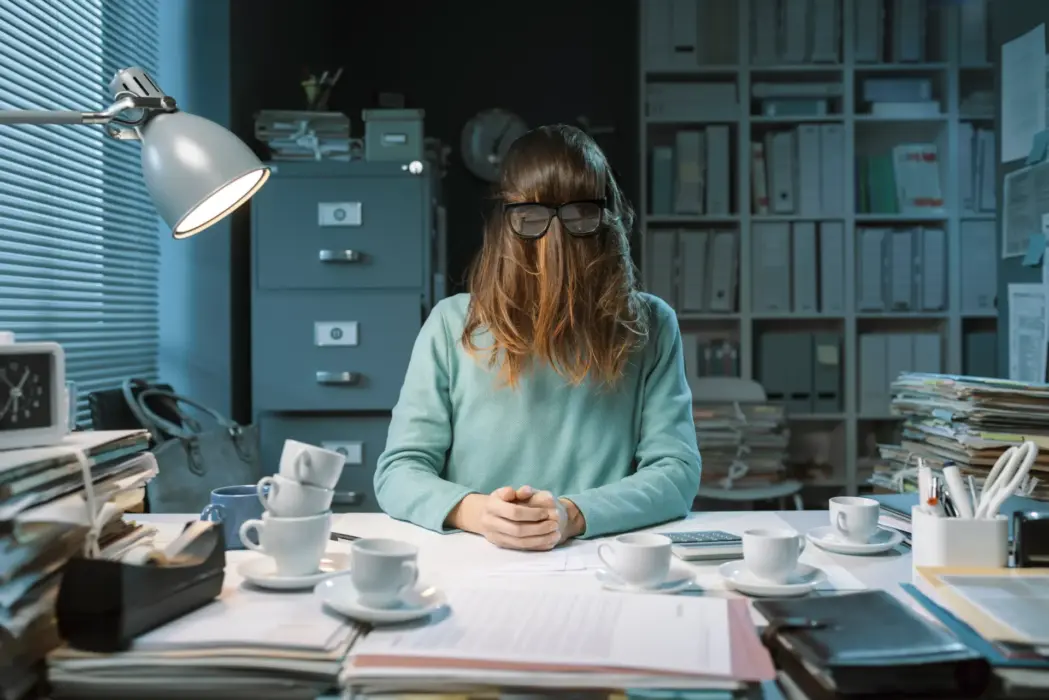 Overwhelmed Office Worker With Hair Covering Face 2026 01 09 12 22 19 Utc