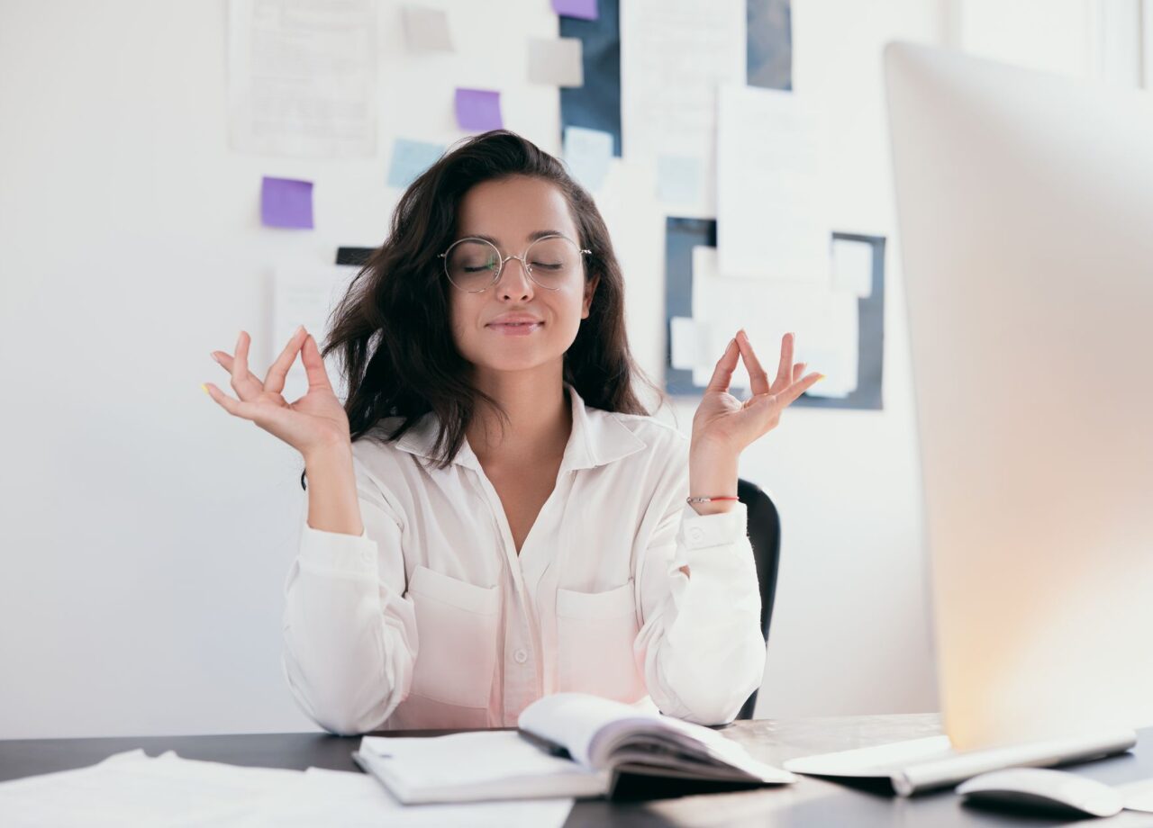 relaxation-meditation-young-woman-working-place